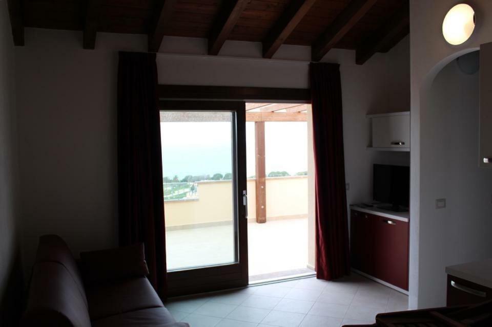 Residence L'Incanto Attici Кастельсардо Экстерьер фото